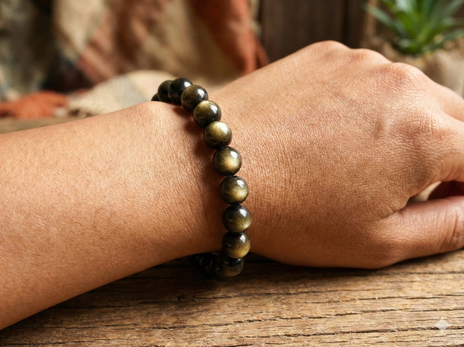 Bracelet obsidienne dorée poignet