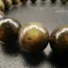 Detail perles obsdienne doree